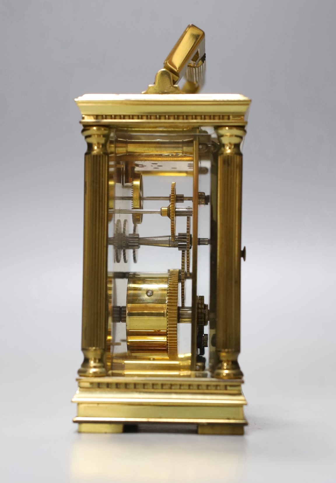 A French brass carriage timepiece, Mappin & Webb, 11.5 cms high.